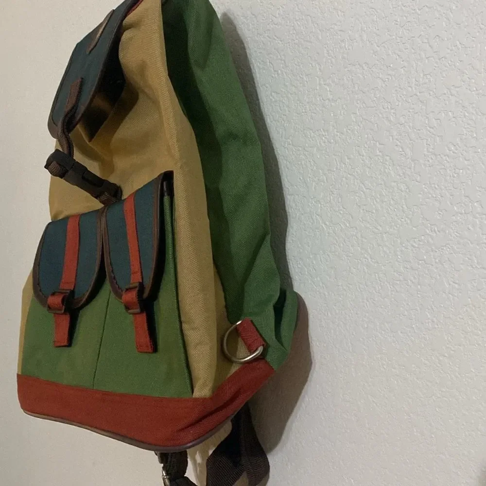 Unissx Water Repellent Multi Color Backpack 11” x 14” x 6” approximately